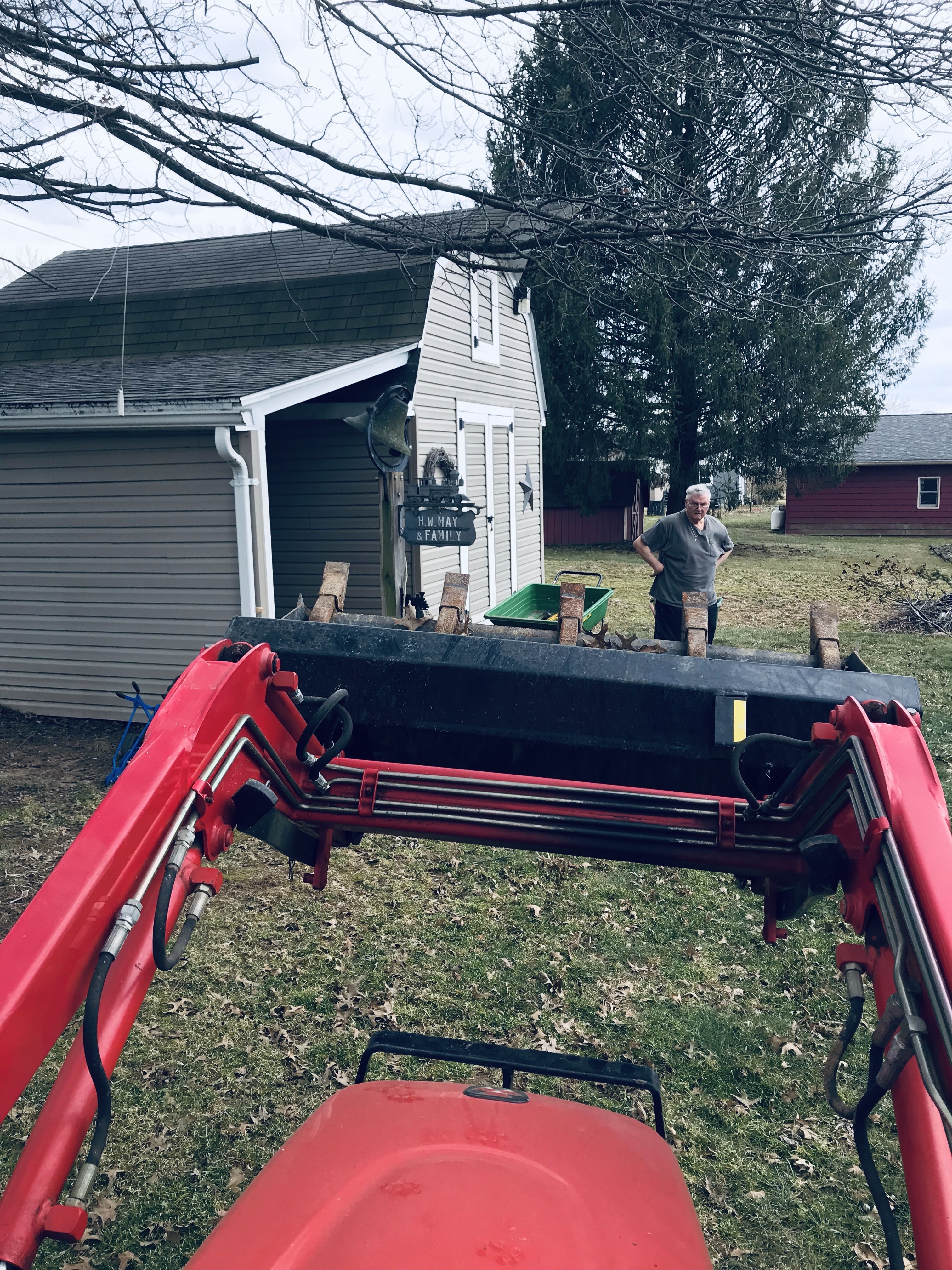 Fired up my tractor and watched my dad work. Turns out Massey Ferguson increased my lifting weight to 600lbs. ðŸ˜‚