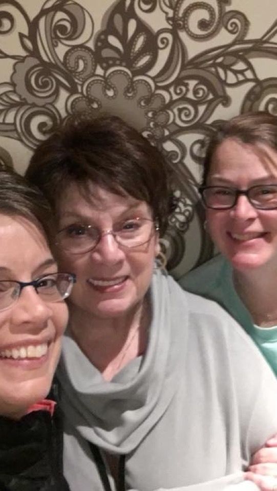 Me with my two daughters. They and my husband are my support system
