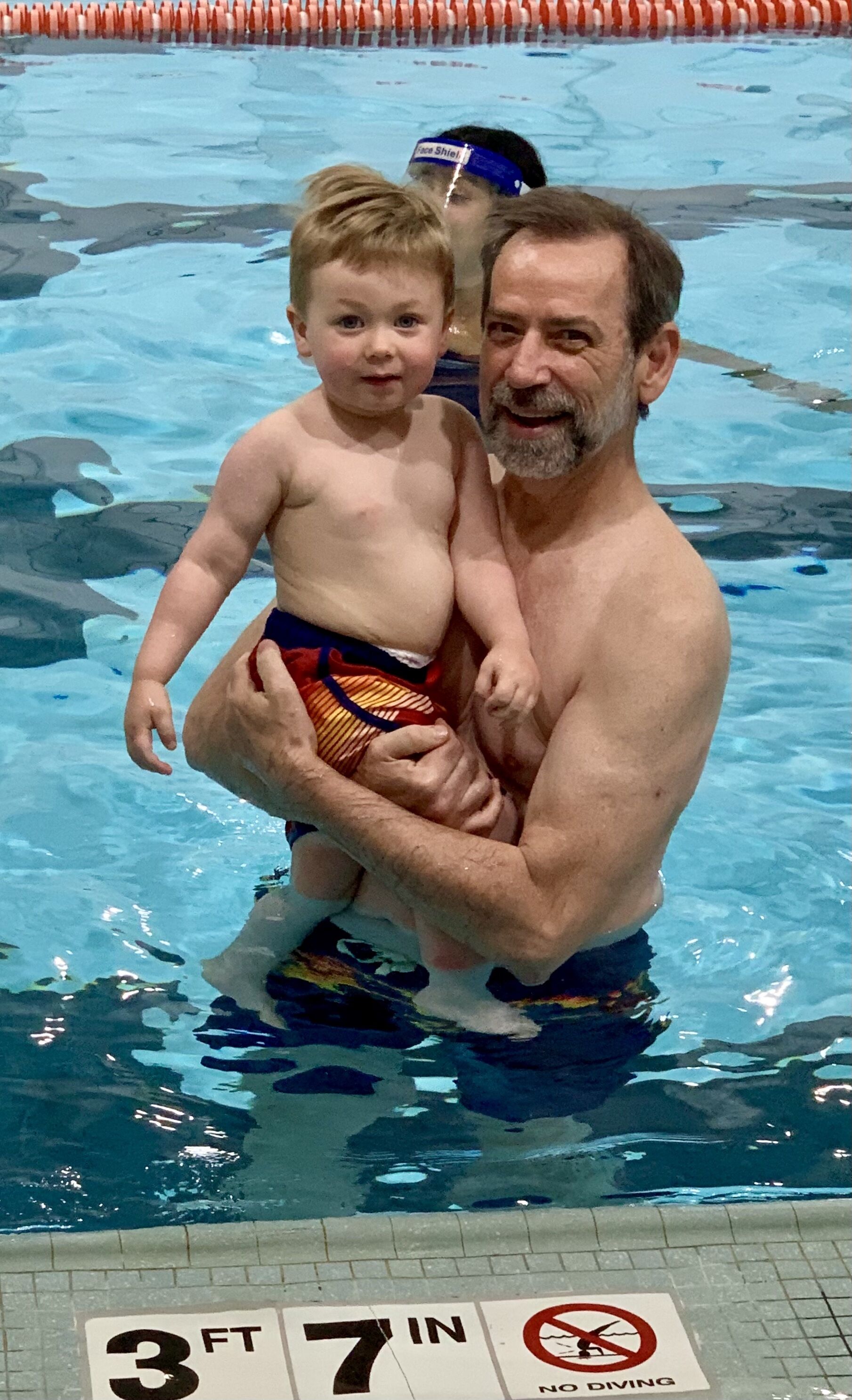 This is why we make the hard decisions before surgery and do the hard work of rehab after surgery: here I am, almost 9 months post-OHS, taking my grandson to his first swim lesson!