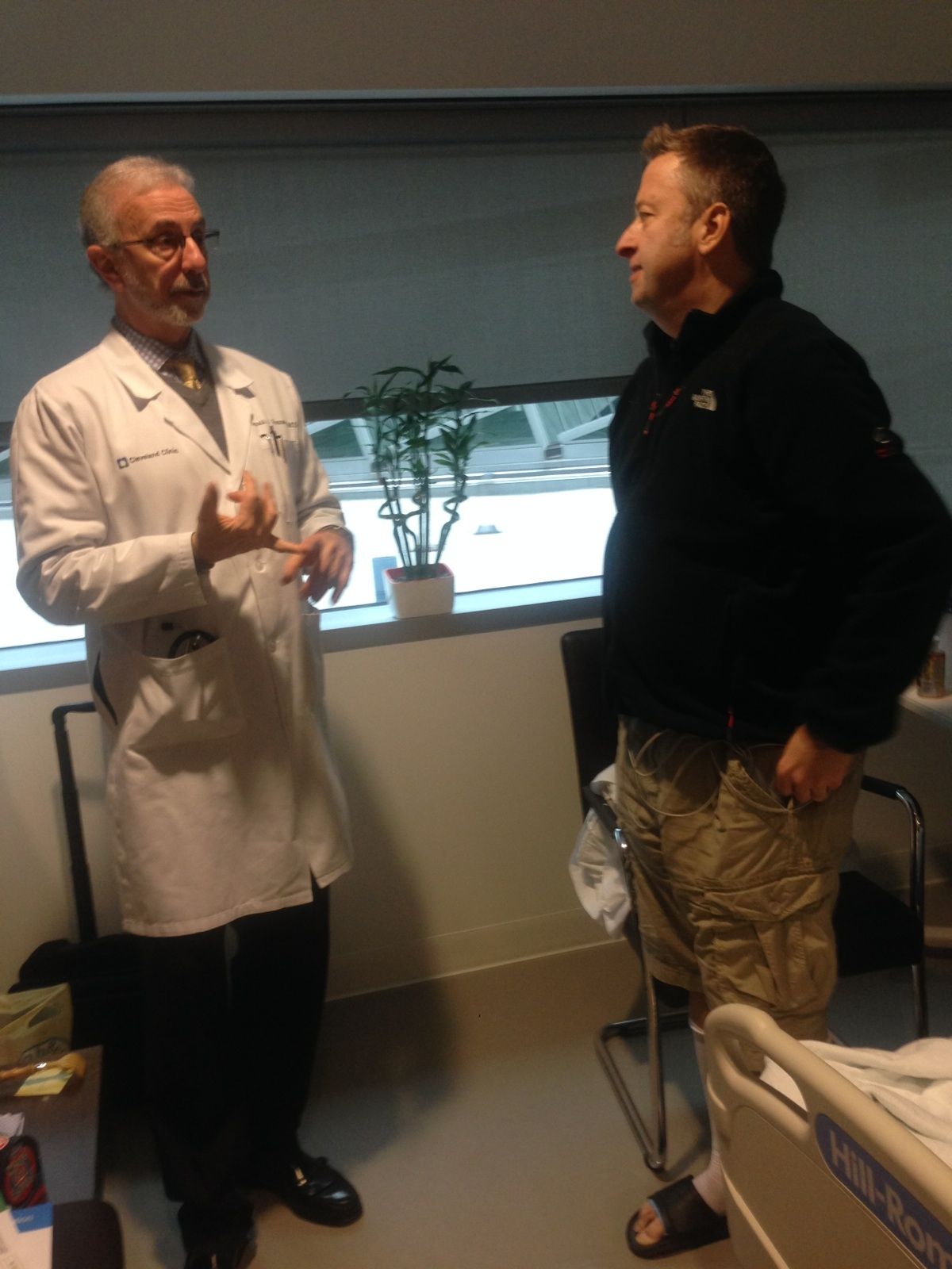 "Hammer Time"... Post-Op Day 5

Me and one of my cardiologists, Dr. Hammer, discussing plans for my afternoon release. I'm still wired up and being monitored but comfortable!