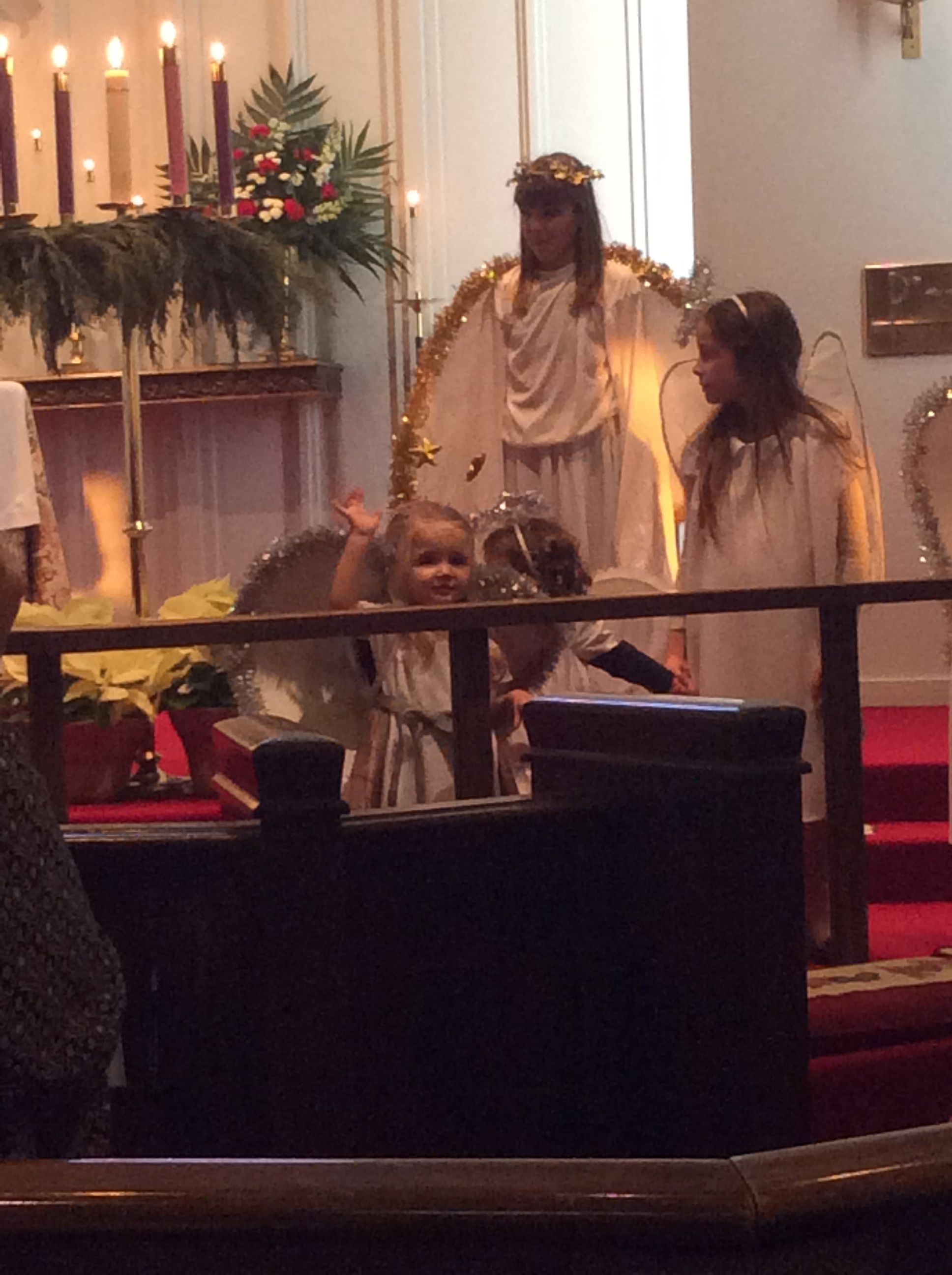 My granddaughter, Avalynn waving Merry Christmas during our church's Christmas Pageant.