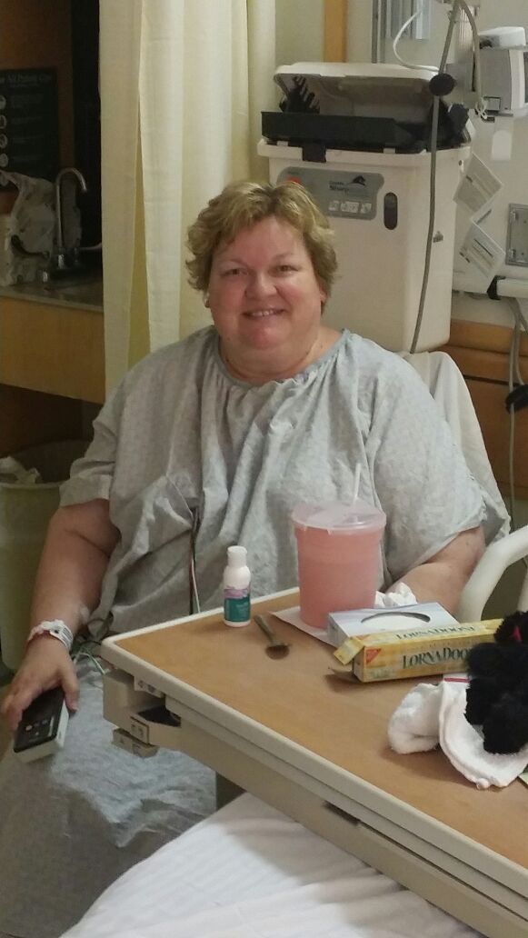48 hours after completion of surgery. I felt good at this moment and let my son snap this photo!