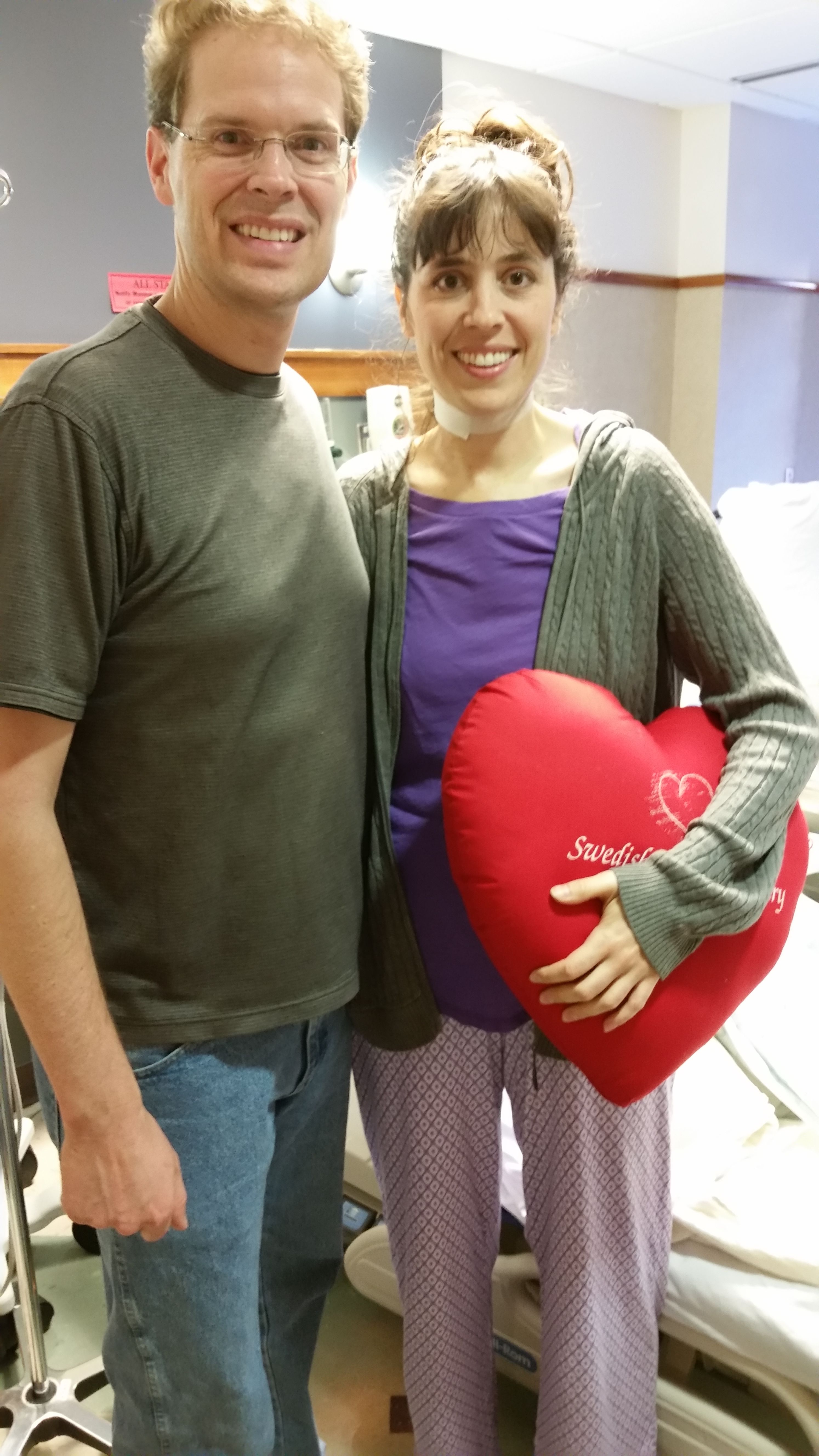 This picture is of my husband and I and is a week old but it is on the day I was released from the hospital. Whoo hoo!