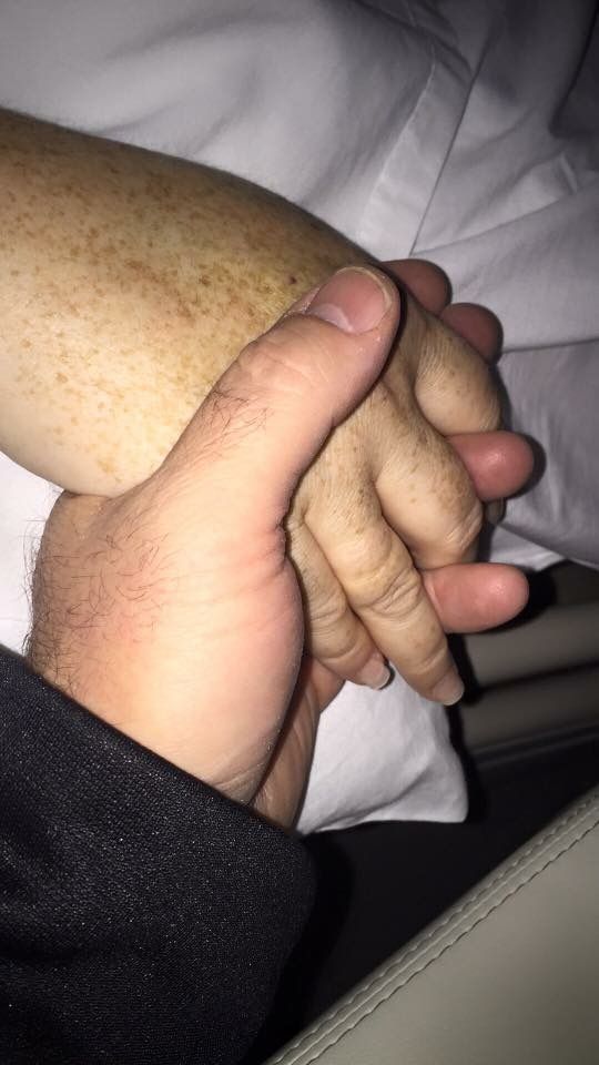 Holding on to Husbands hand!! There is magic in hold a loved ones hand for comfort