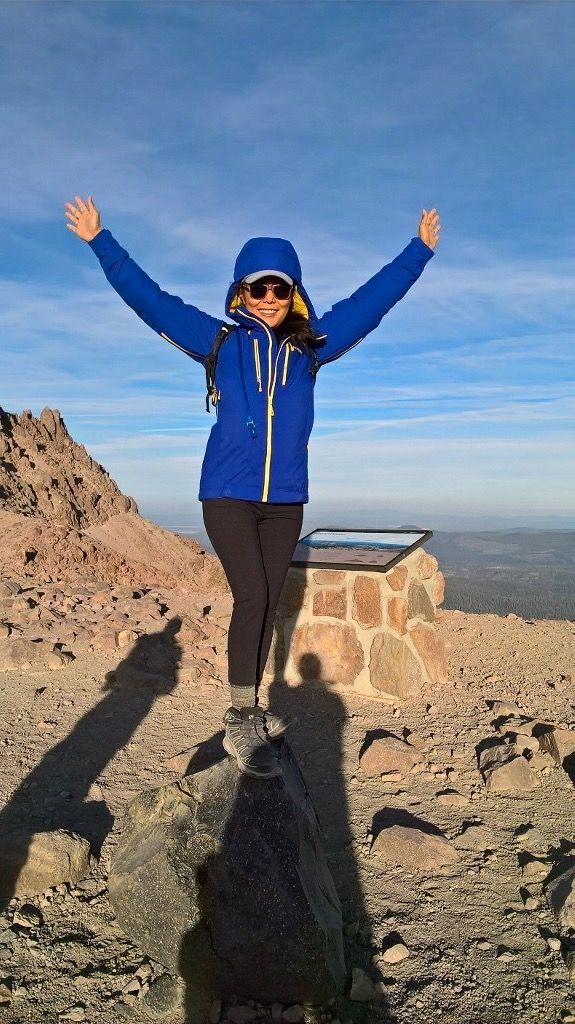 Celebratory pose standing on the black rock @ the peak!