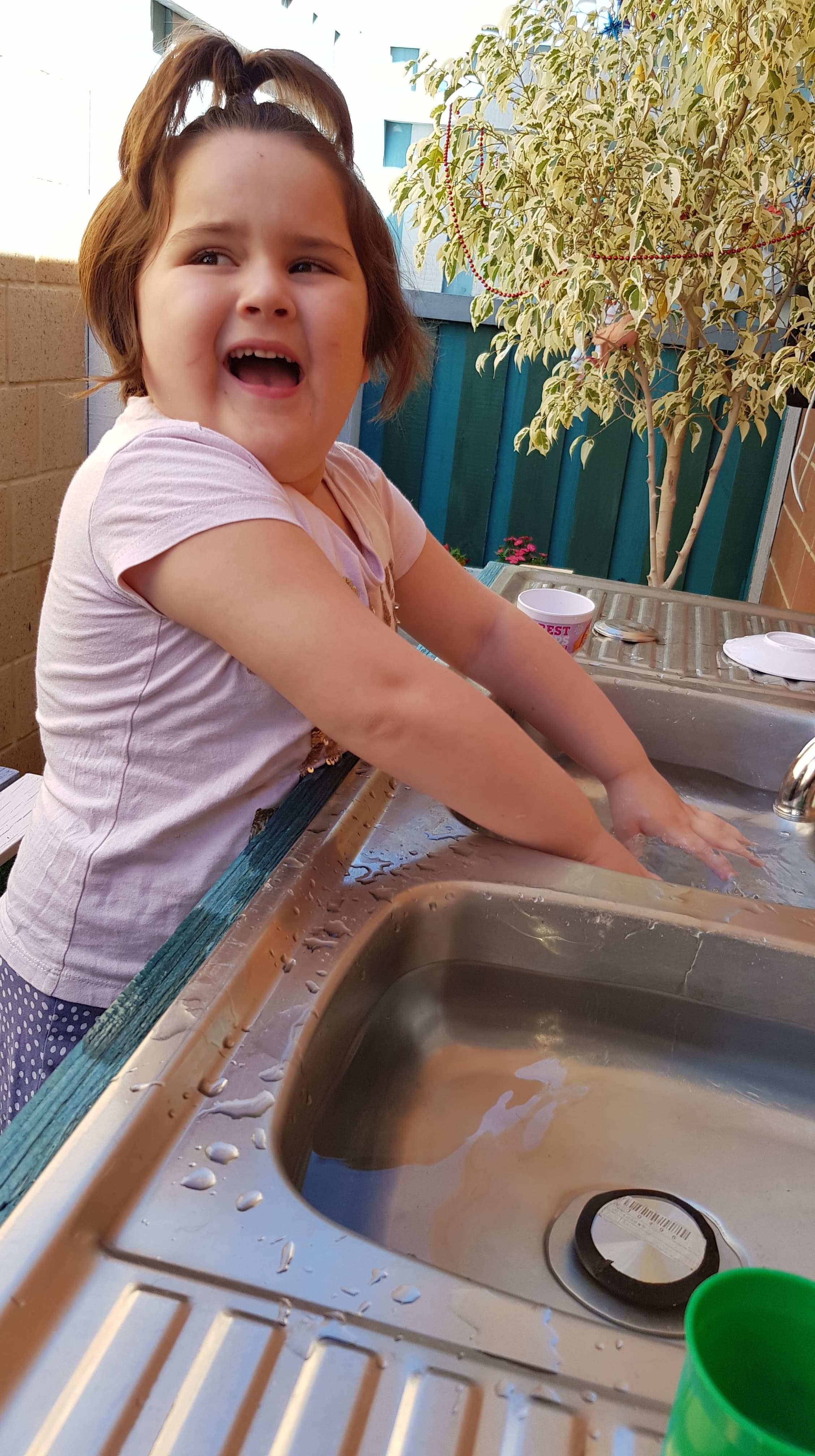 So my beautiful Dolly loving the outdoor garden and play area we made just for her x