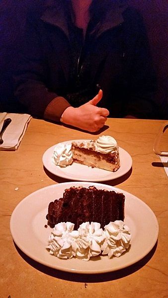 The thumb belongs to me. So does the carrot cake cheesecake. DH got the black-out cake in pic. He got more whipped cream than me. Not fair;)