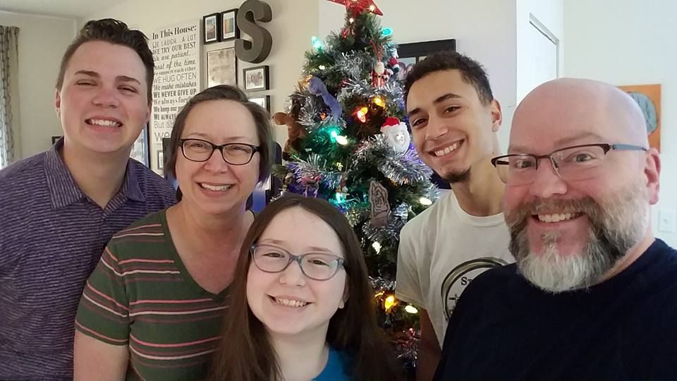 This is my loving family! Trey is 25, Shelby is 11 and Ezra is 18. My husband, Mike, is my favorite person in the whole wide world.