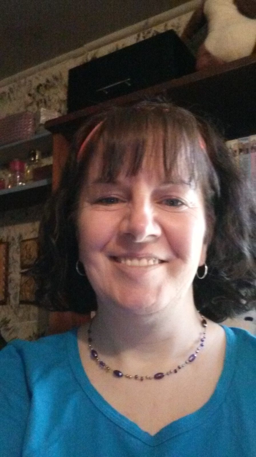 My first picture. Had my hair cut so it'll make it easier to take care of after surgery.