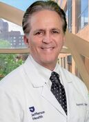 Dr. Raymond Singer